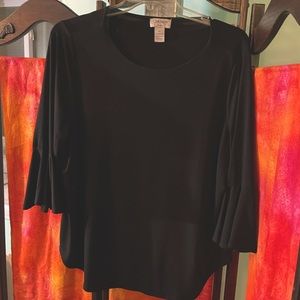 Black scoop neck top with 3/4 ruffle edged sleeves.